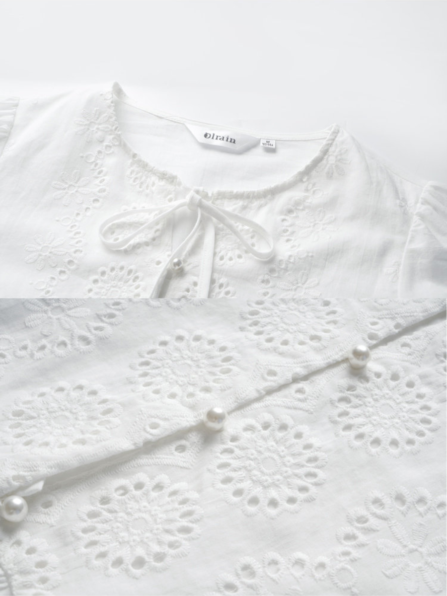 Fleur Eyelet Peplum Blouse