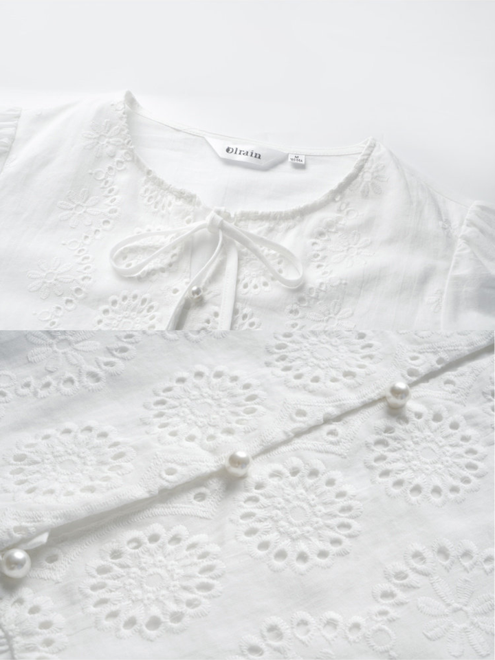 Fleur Eyelet Peplum Blouse