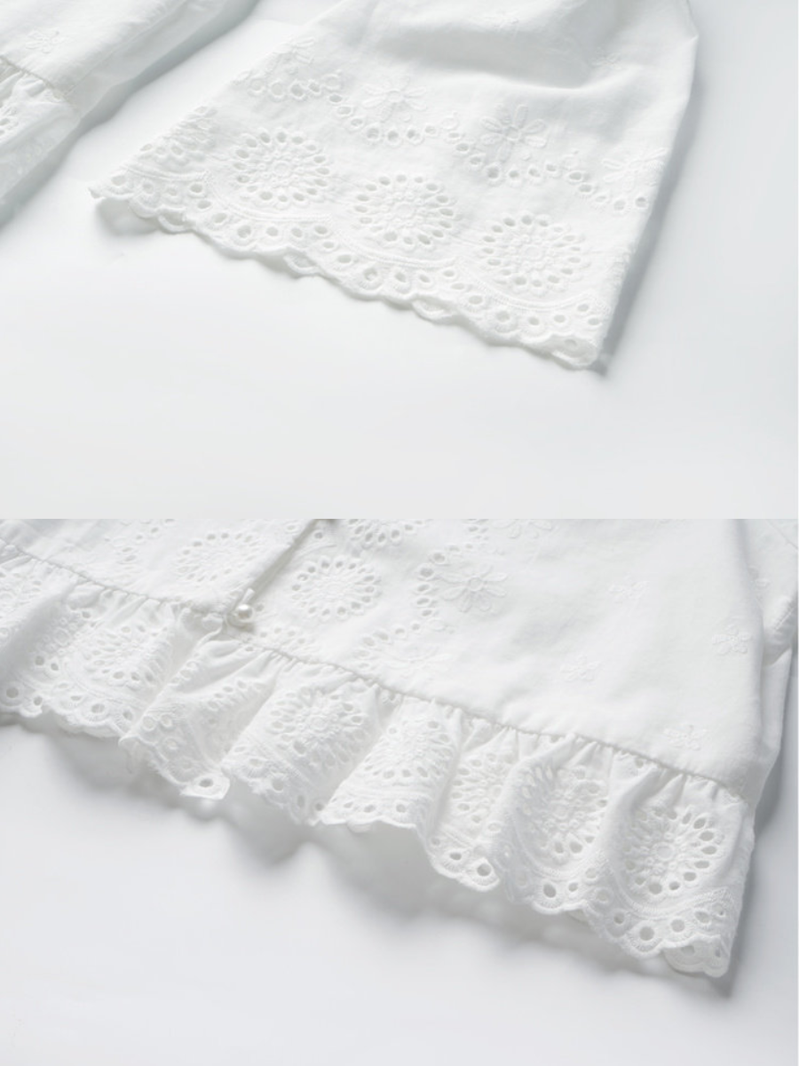 Fleur Eyelet Peplum Blouse